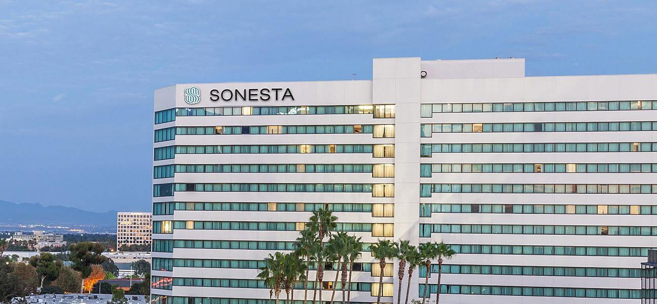 Sonesta hotel exterior at sunset