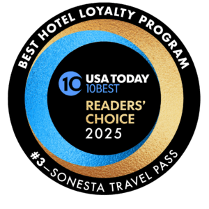 best hotel loyalty program round multicolored badge for Sonesta Travel Pass